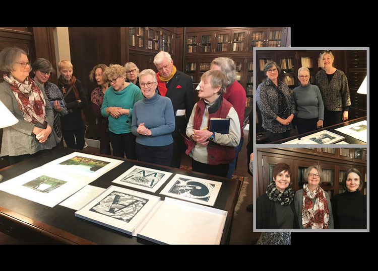 NEBA members viewing photogravures by Judy Hochberg